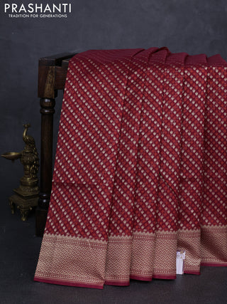 Banarasi silk cotton saree maroon with allover thread & zari woven buttas and temple design zari woven border