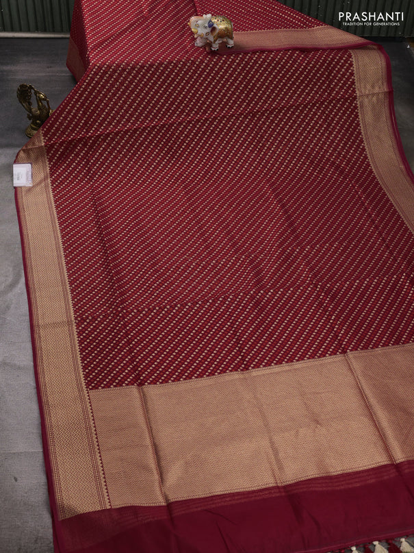 Banarasi silk cotton saree maroon with allover thread & zari woven buttas and temple design zari woven border