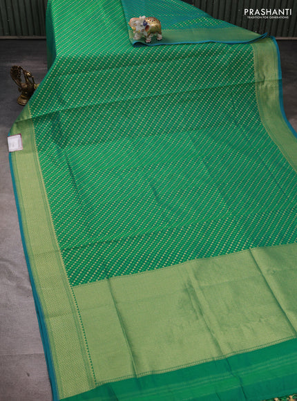 Banarasi silk cotton saree green with allover thread & zari woven buttas and temple design zari woven border