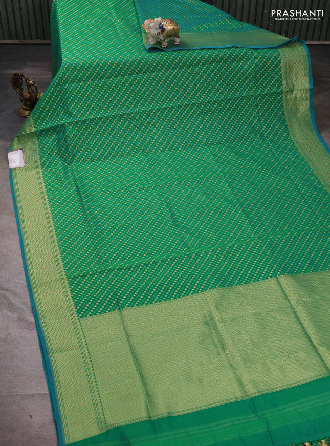 Banarasi silk cotton saree green with allover thread & zari woven buttas and temple design zari woven border