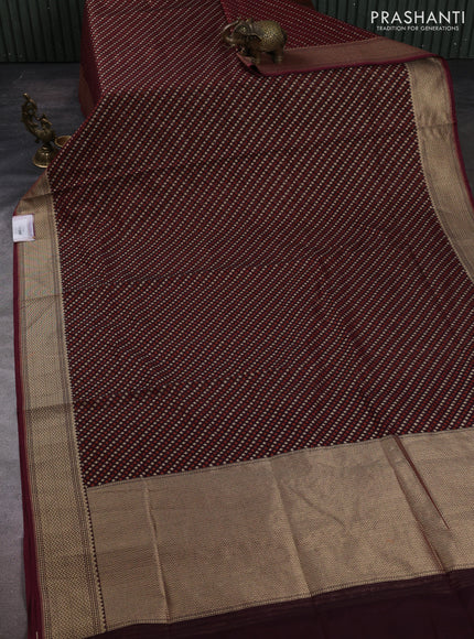 Banarasi silk cotton saree deep maroon with allover thread & zari woven buttas and temple design zari woven border