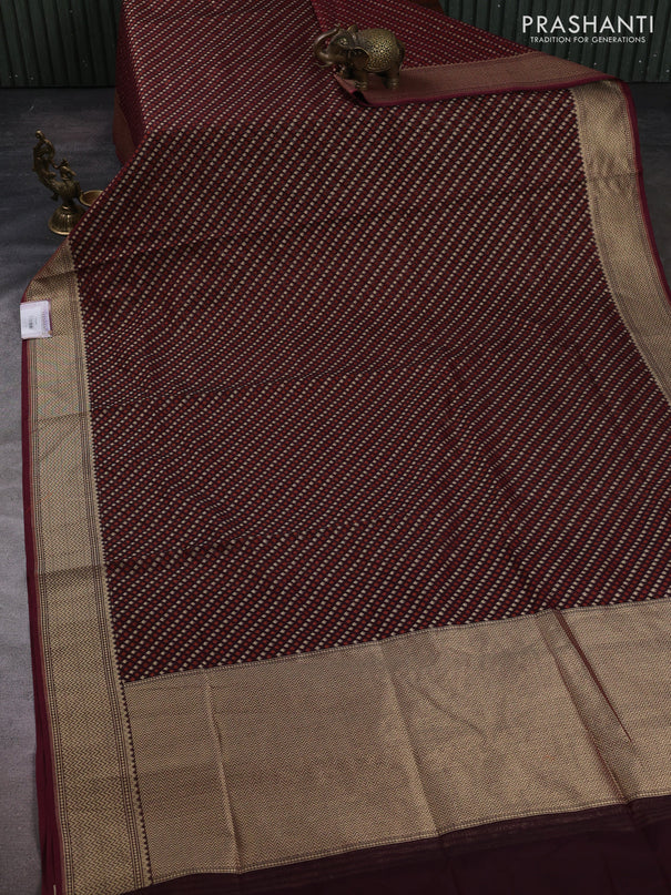 Banarasi silk cotton saree deep maroon with allover thread & zari woven buttas and temple design zari woven border