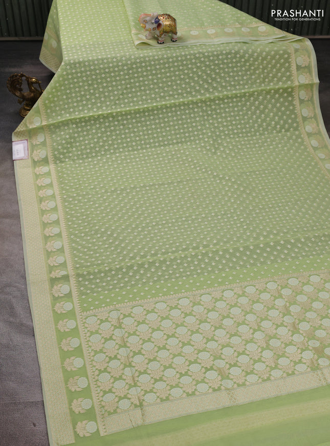 Banarasi silk cotton saree mild pista green with allover thread & zari woven buttas and thread & zari woven border