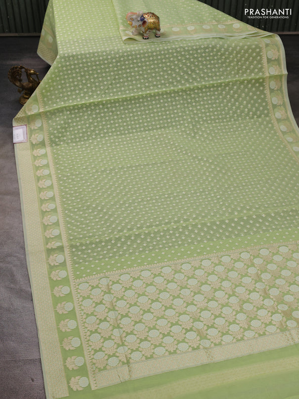 Banarasi silk cotton saree mild pista green with allover thread & zari woven buttas and thread & zari woven border