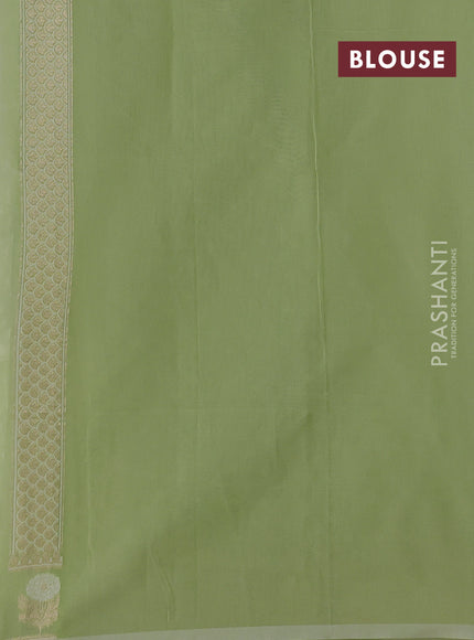 Banarasi silk cotton saree mild pista green with allover thread & zari woven buttas and thread & zari woven border