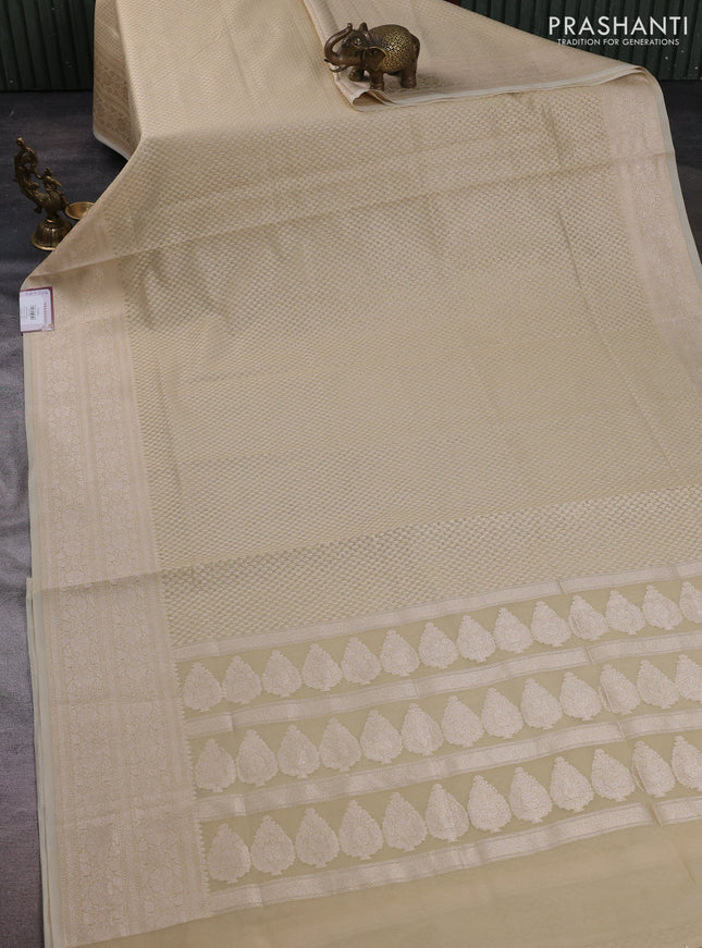 Banarasi silk cotton saree beige with allover thread & zari woven brocade weaves and thread & zari woven border