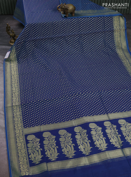 Banarasi silk cotton saree peacock blue with allover thread & zari woven buttas and temple design zari woven border