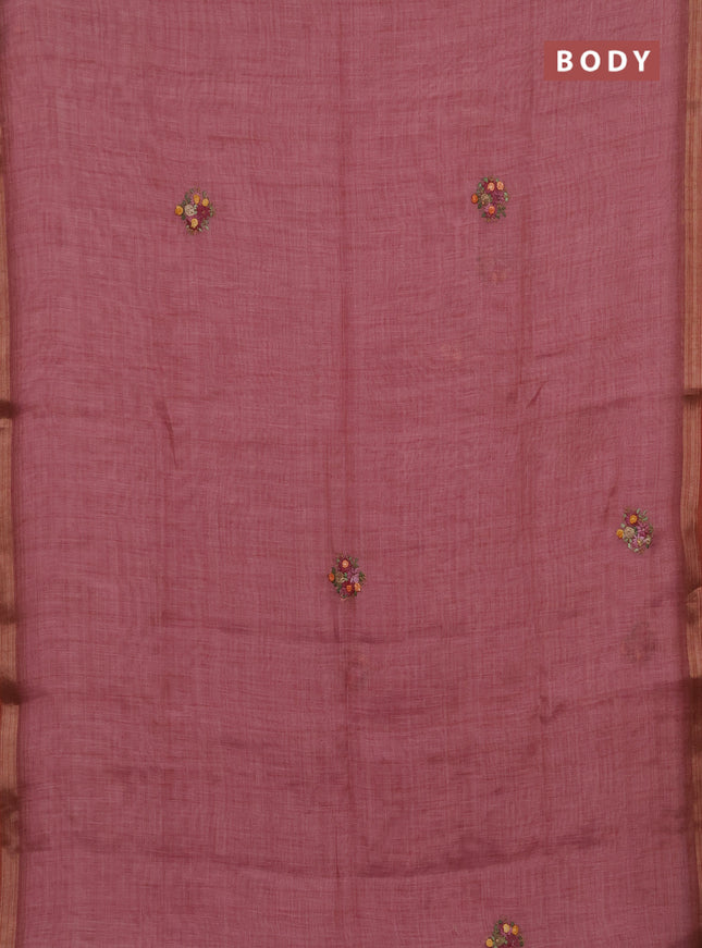 Tissue linen saree pink with embroidery buttas and embroidery pallu