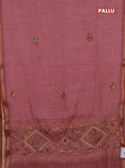 Tissue linen saree pink with embroidery buttas and embroidery pallu