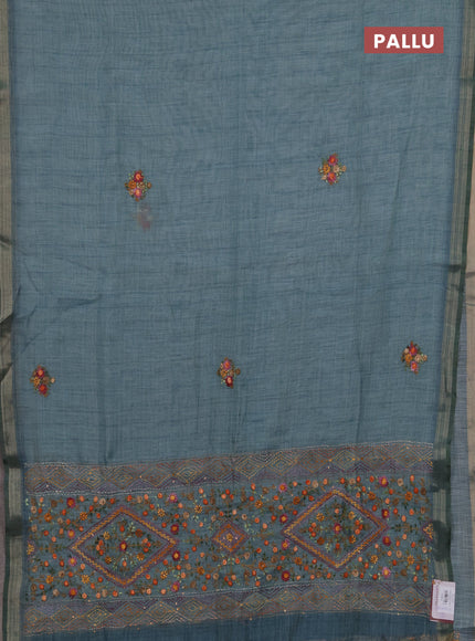 Tissue linen saree teal blue with embroidery buttas and embroidery pallu
