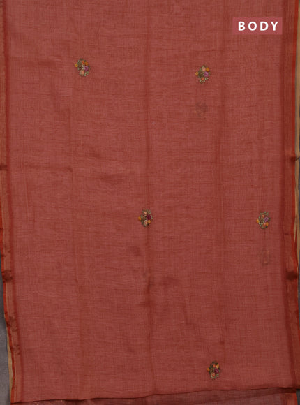 Tissue linen saree red with embroidery buttas and embroidery pallu