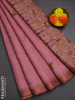 Tissue linen saree light pink with embroidery buttas and embroidery pallu