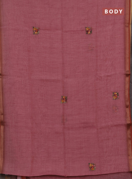 Tissue linen saree light pink with embroidery buttas and embroidery pallu