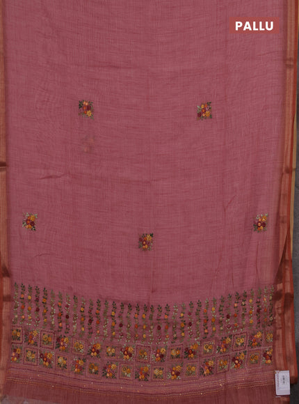 Tissue linen saree light pink with embroidery buttas and embroidery pallu