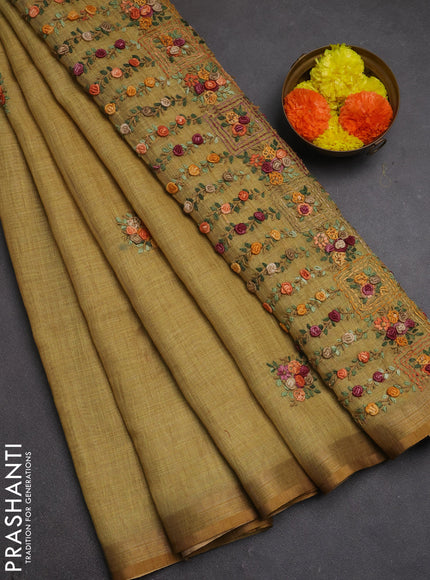 Tissue linen saree mustard yellow with embroidery buttas and embroidery pallu
