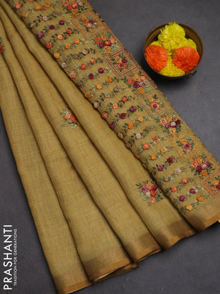 Tissue linen saree mustard yellow with embroidery buttas and embroidery pallu