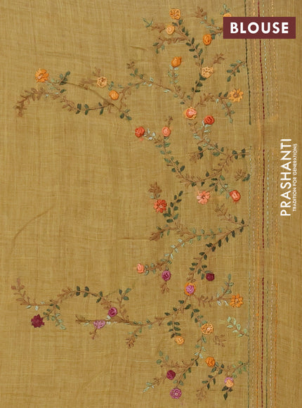 Tissue linen saree mustard yellow with embroidery buttas and embroidery pallu