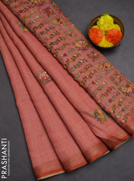 Tissue linen saree peach shade with embroidery buttas and embroidery pallu