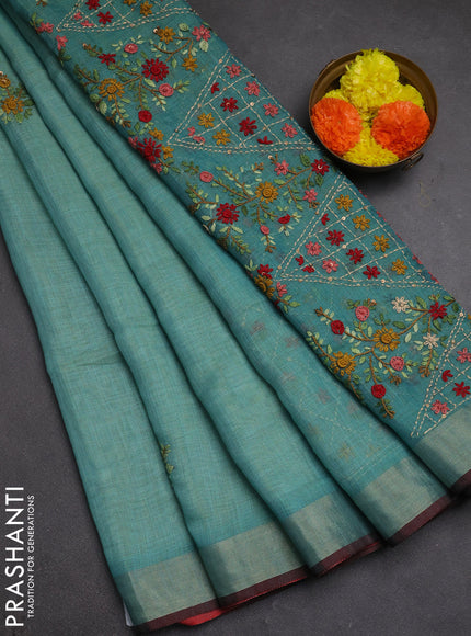 Tissue linen saree teal blue and maroon with embroidery buttas and embroidery pallu