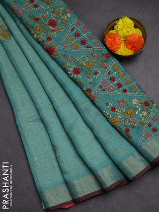 Tissue linen saree teal blue and maroon with embroidery buttas and embroidery pallu