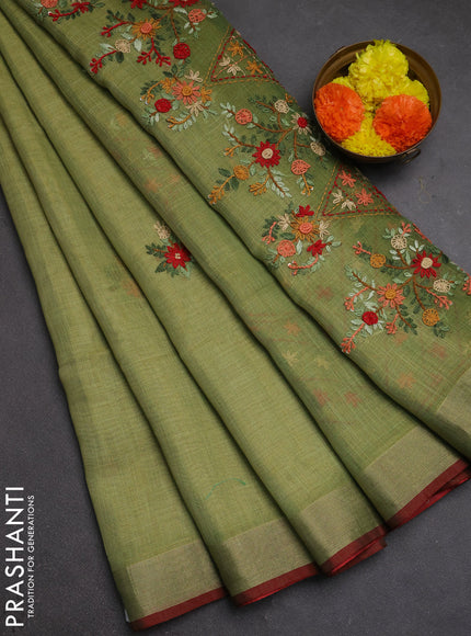 Tissue linen saree light green and maroon with embroidery buttas and embroidery pallu