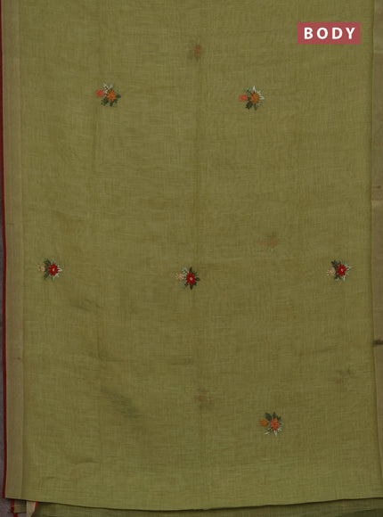 Tissue linen saree light green and maroon with embroidery buttas and embroidery pallu