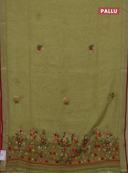 Tissue linen saree light green and maroon with embroidery buttas and embroidery pallu