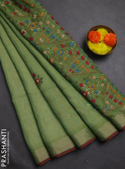 Tissue linen saree green and maroon with embroidery buttas and embroidery pallu