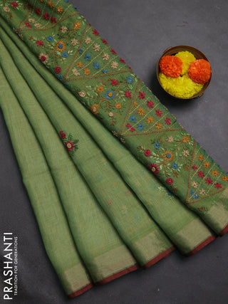 Tissue linen saree green and maroon with embroidery buttas and embroidery pallu