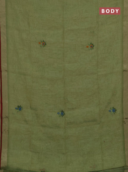 Tissue linen saree green and maroon with embroidery buttas and embroidery pallu