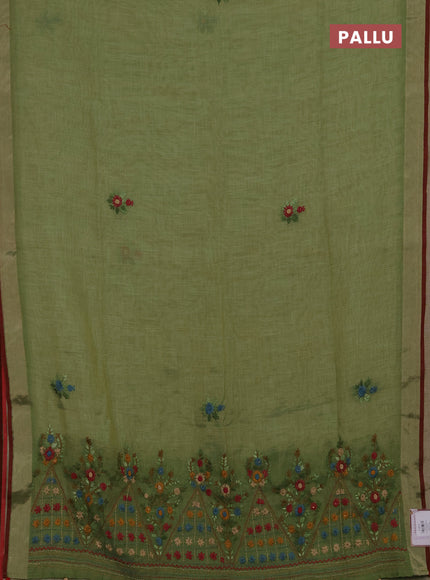 Tissue linen saree green and maroon with embroidery buttas and embroidery pallu