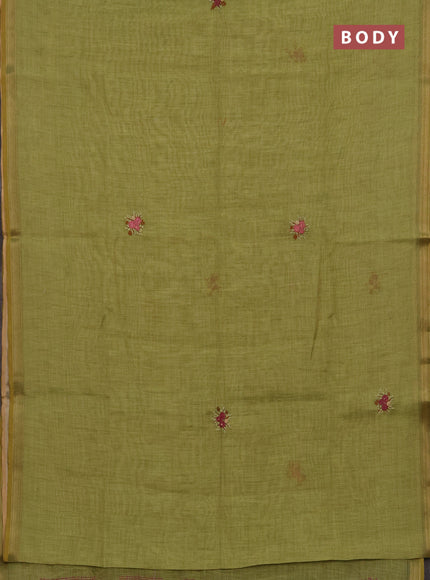 Tissue linen saree green with embroidery buttas and embroidery kantha stitch work pallu