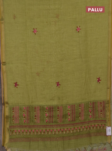 Tissue linen saree green with embroidery buttas and embroidery kantha stitch work pallu