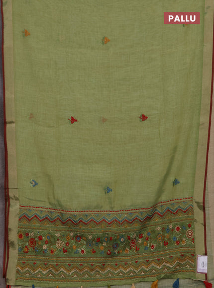 Tissue linen saree green and maroon with embroidery buttas and embroidery kantha stitch work pallu