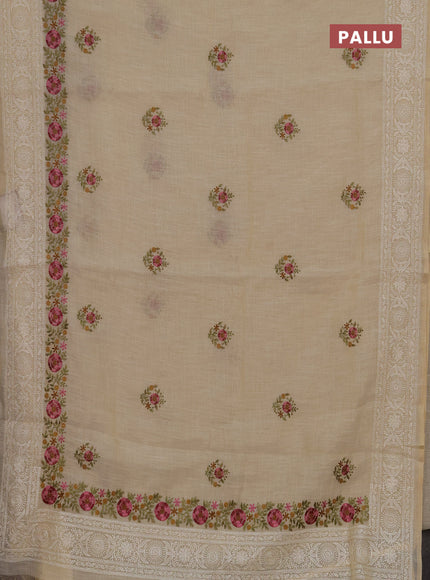 Tissue linen saree cream and pink with embroidery buttas and embroidery border