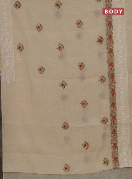 Tissue linen saree cream and rust shade with embroidery buttas and embroidery border