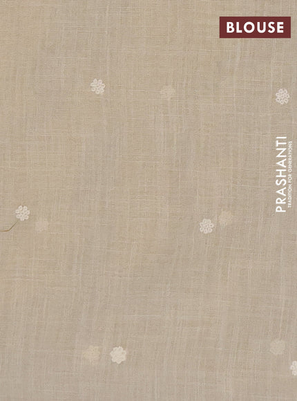 Tissue linen saree cream and rust shade with embroidery buttas and embroidery border