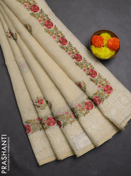Tissue linen saree cream and peach shade with embroidery buttas and embroidery border