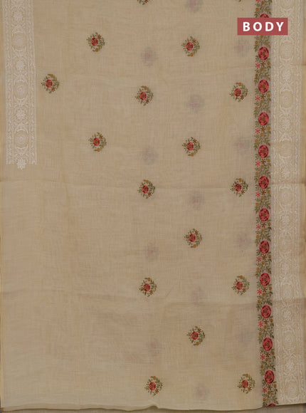 Tissue linen saree cream and peach shade with embroidery buttas and embroidery border