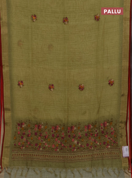 Linen cotton saree light green with embroidery buttas and embroidery pallu