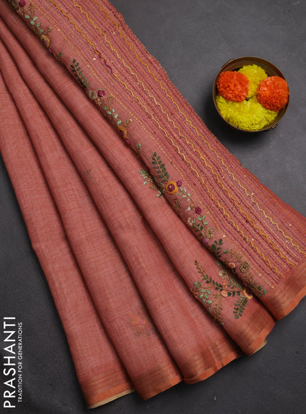 Linen cotton saree peach shade with embroidery buttas and embroidery pallu