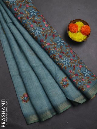 Linen cotton saree pastel blue with embroidery buttas and embroidery pallu