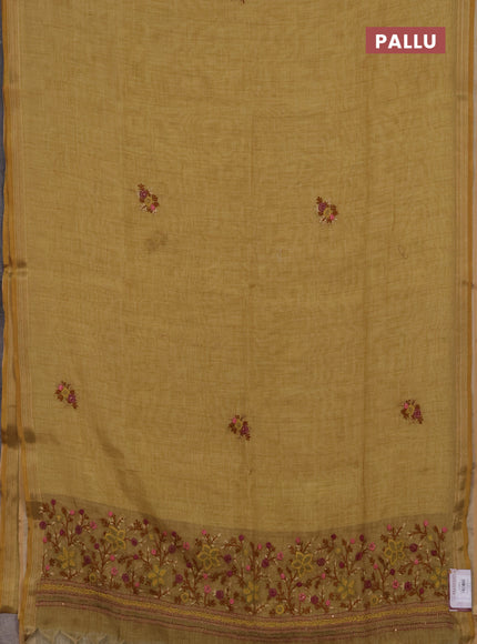 Linen cotton saree pale yellow with embroidery buttas and embroidery pallu