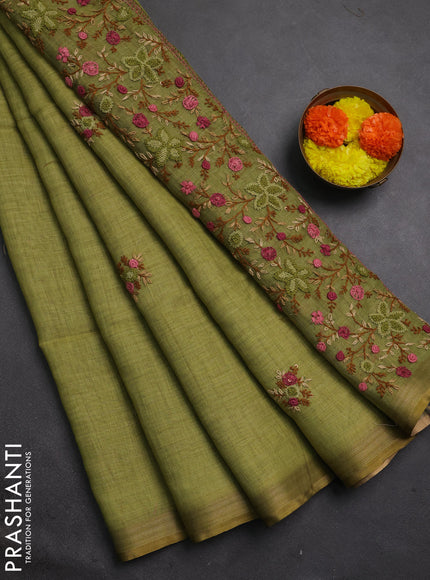 Linen cotton saree light green with embroidery buttas and embroidery pallu