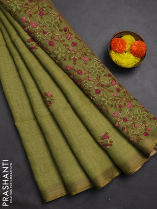 Linen cotton saree light green with embroidery buttas and embroidery pallu