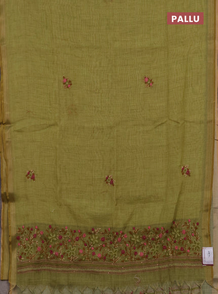 Linen cotton saree light green with embroidery buttas and embroidery pallu