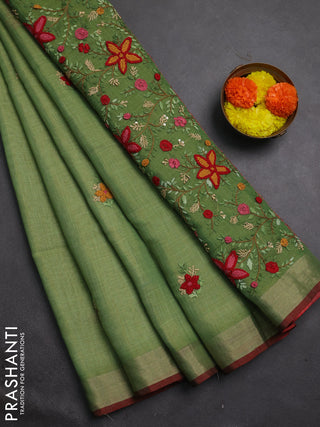 Linen cotton saree green with embroidery buttas and embroidery pallu