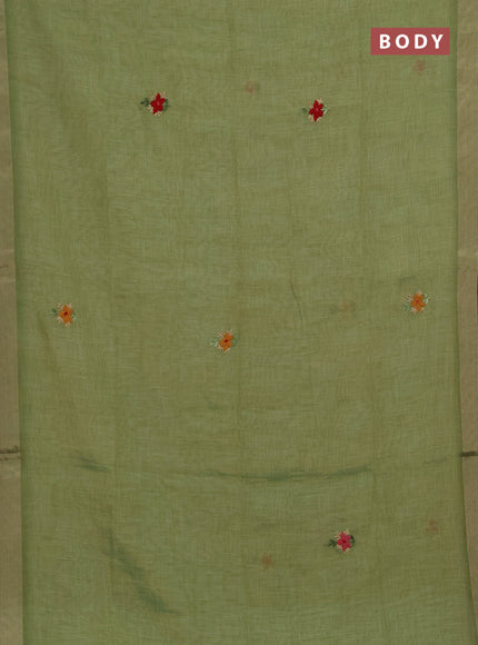 Linen cotton saree green with embroidery buttas and embroidery pallu