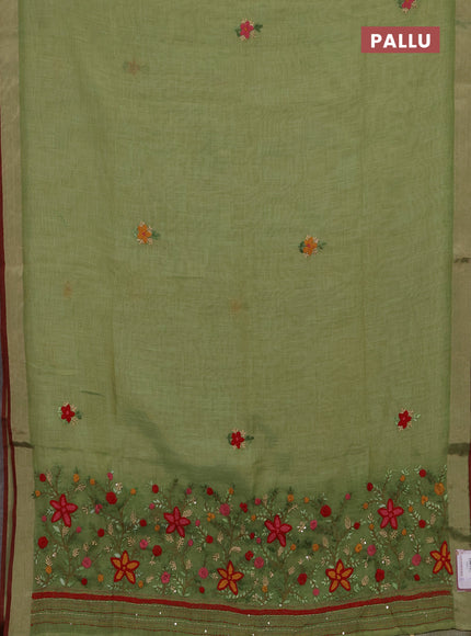 Linen cotton saree green with embroidery buttas and embroidery pallu