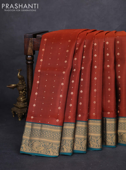 Rust  & Peacock Green Pure Soft Silk Saree - Zari Buttas